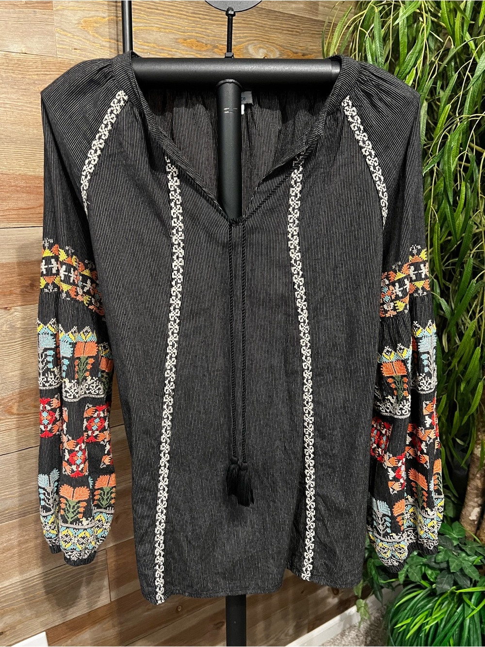 Sundance black blouse with embroidered sleeves. L
